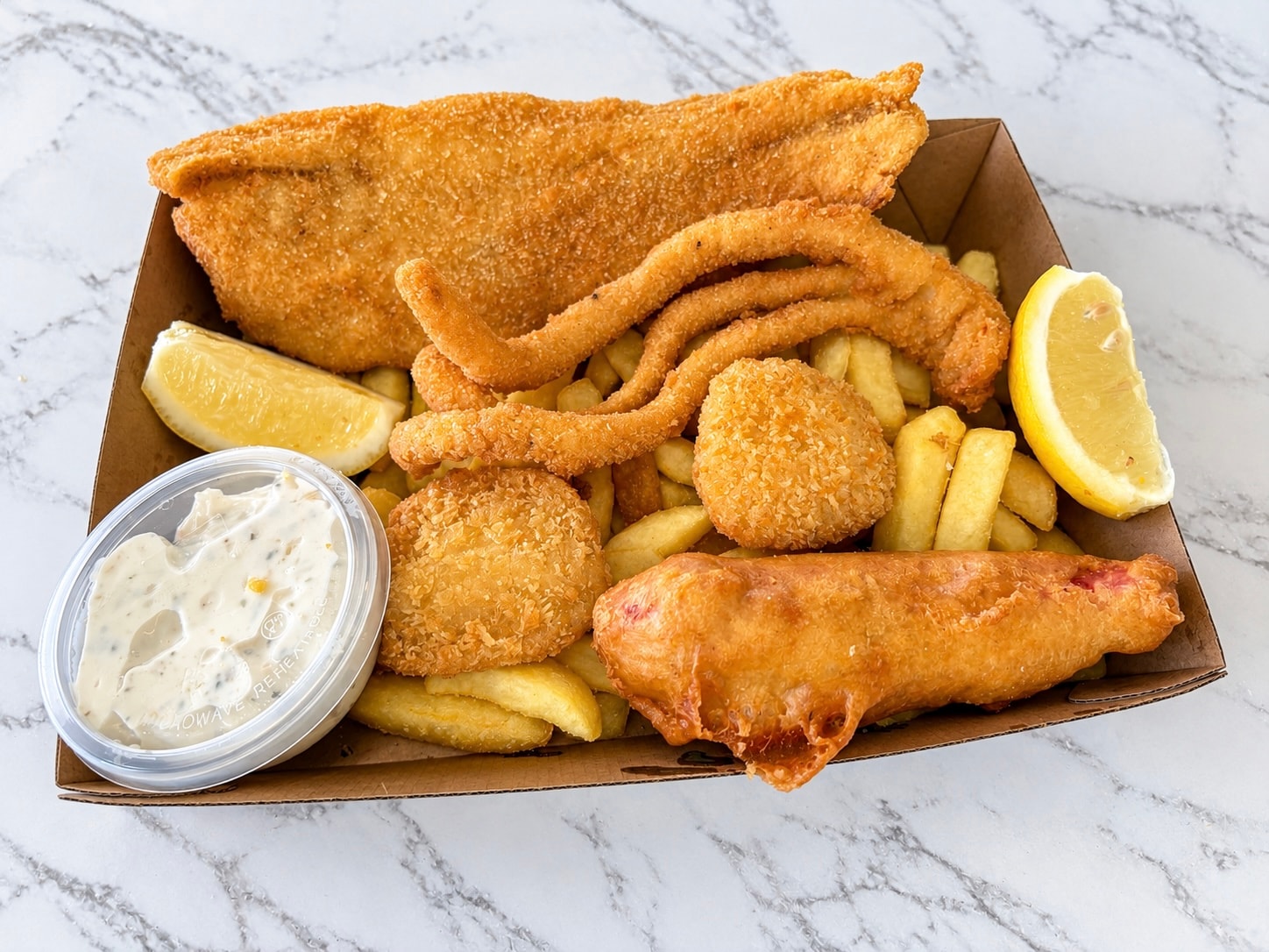 Fisherman Basket — seafood platter with fish, calamari and chips