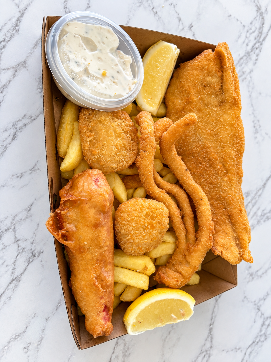 Seafood basket with fish, calamari and chips